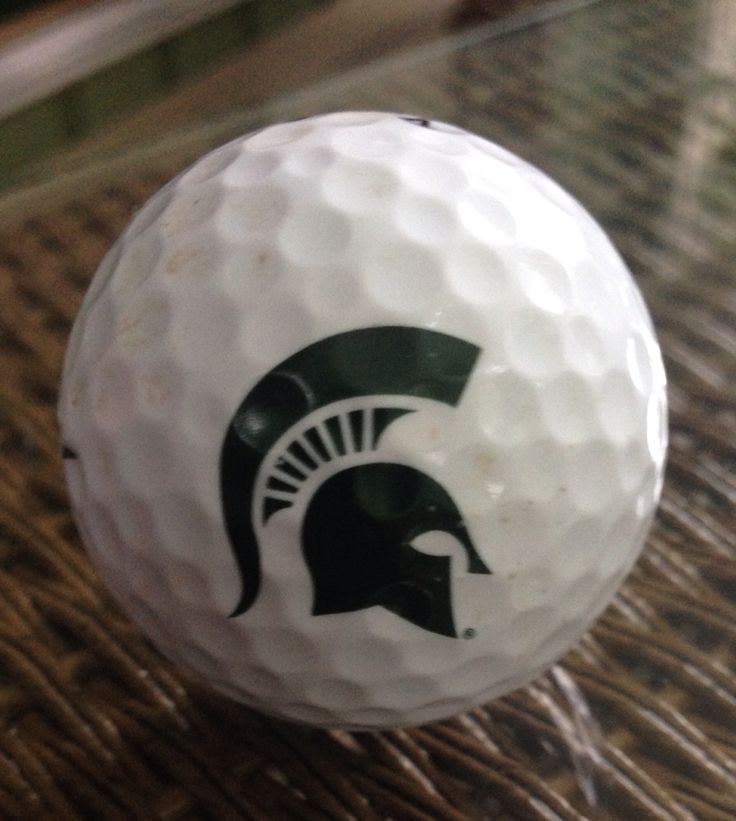 golf ball with a spartan head on it